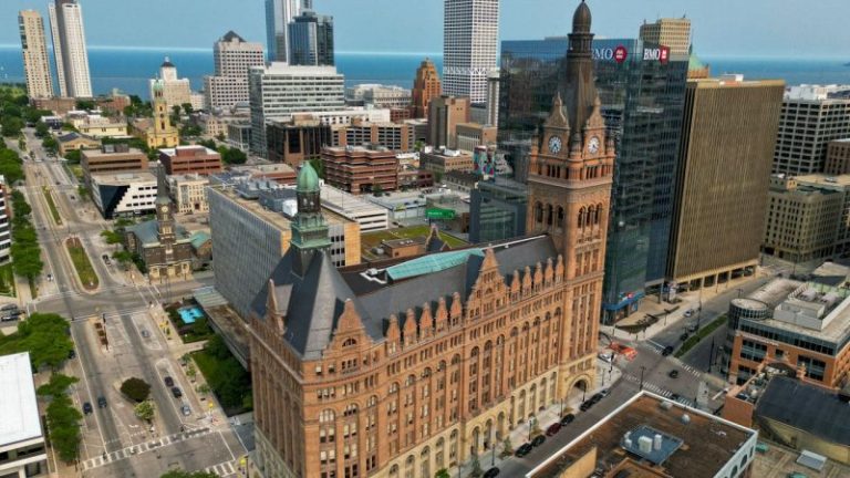 Evers signs bipartisan sales tax bill aimed at sparing Milwaukee from bankruptcy