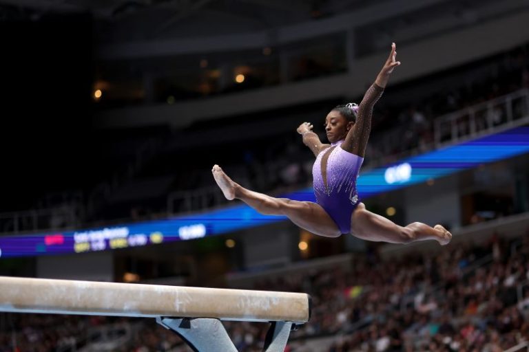 Can Simone Biles maintain her lead and make history at the US Gymnastics Championships?