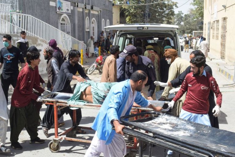 At least 52 killed after blast rips through religious procession in restive southwest Pakistan