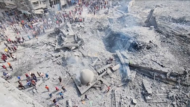 Desperately needed aid piles up outside Gaza as WHO warns water is running out