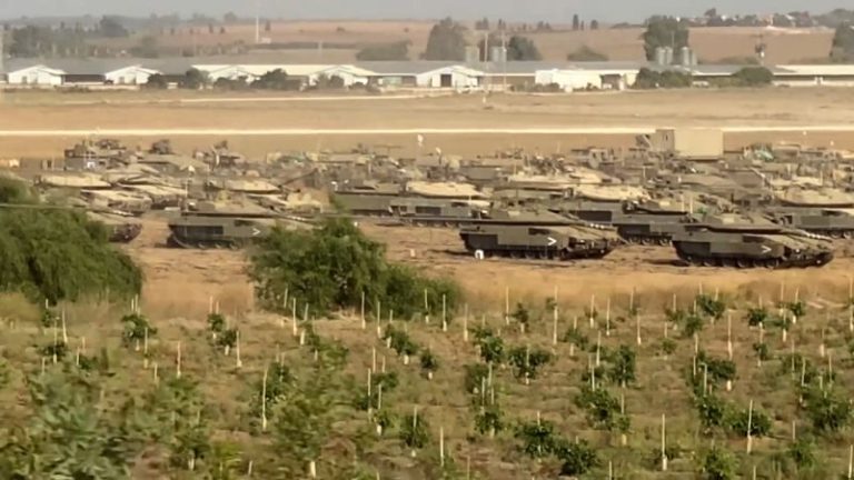 Trickle of aid enters Gaza as Israel ramps up airstrikes and Palestinian deaths keep mounting