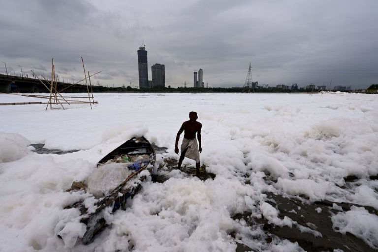 Toxic foam coats sacred river near New Delhi as Indian capital battles hazardous pollution
