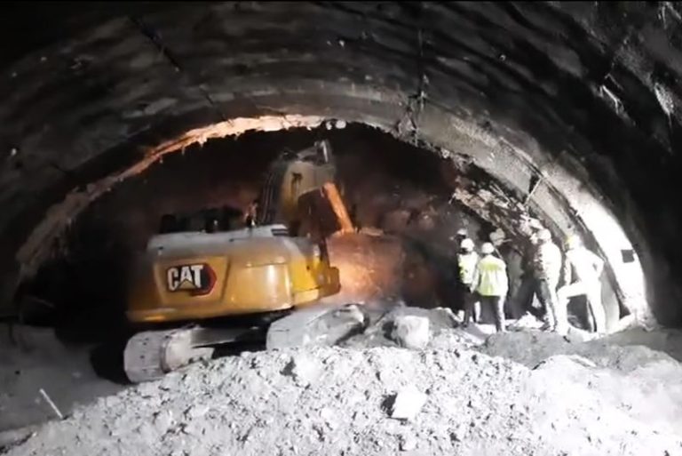 Rescuers scramble to reach up to 40 workers trapped in Himalayan tunnel collapse