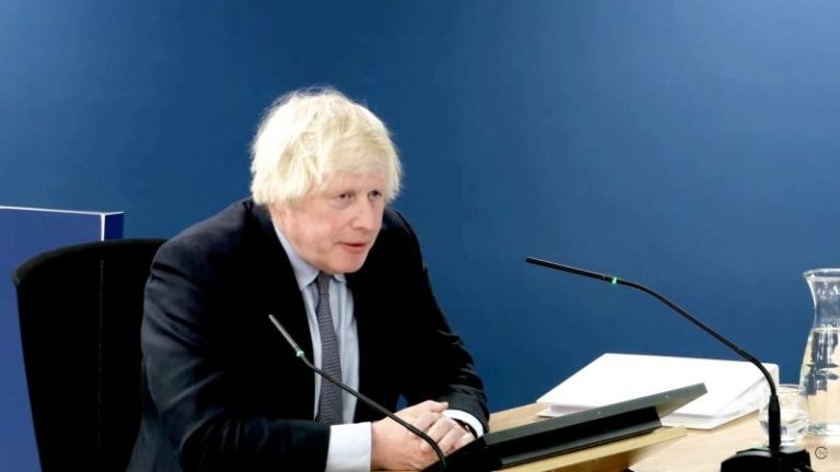 ‘The dead can’t hear your apologies:’ Boris Johnson heckled as he attempts to say sorry for Covid deaths