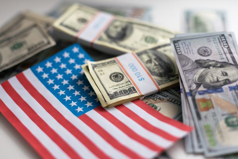 As Fed lowers rates, advisors urge shift from cash to higher-risk investments