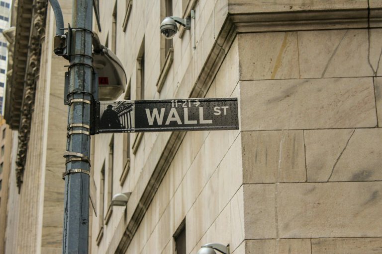 Dow and S&P slip on rising trade tensions; Groupon shares jump 35%, while airline stocks continue fall